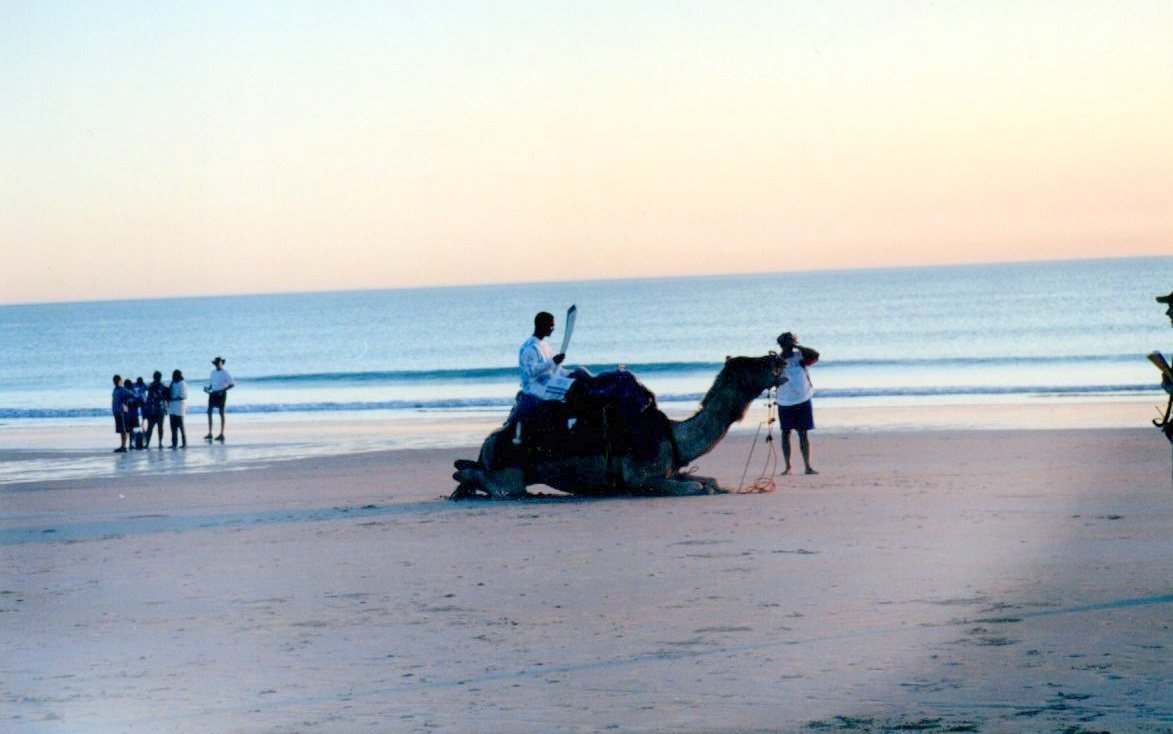 Torch on camel on Cable Beach